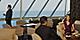 couple enjoying drinks in departure lounge
